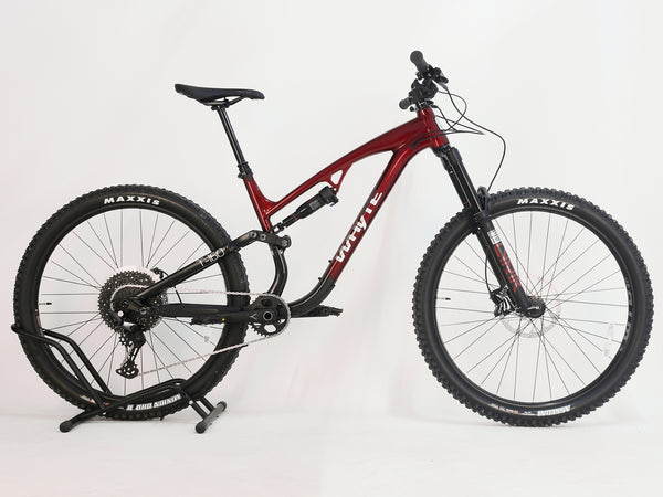 Detail view of the RockShox Deluxe Select shock on the Whyte T-160 S 2025, emphasizing adjustable rebound and compression settings.