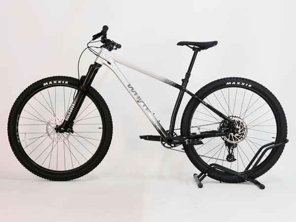 Whyte 629 V6 mountain bike in like new condition with Maxxis tires on a white background.
