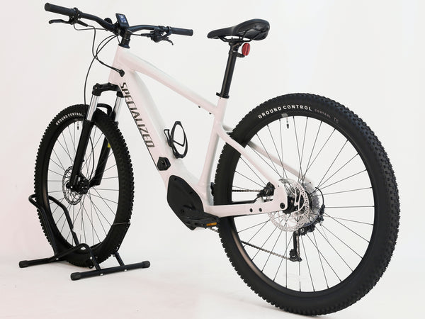 Zipped perspective showing the Specialized Turbo Tero 3.0’s wheel and tire, designed for optimum grip on trails.