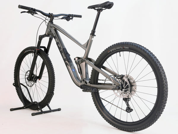 Back angle shot of Trek Slash 7 Gen 5 mountain bike, X-LARGE size, highlighting Lyrik suspension and SLX gearing, original RRP: £2,775.00, available now for £1,760.00, with free rapid delivery.