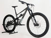 Front angle of the Specialized Status 160 mountain bike, displaying its aggressive geometry for better handling.
