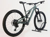 Side profile image of the used Specialized Stumpjumper Comp Alloy / MEDIUM / FOX, showcasing the gloss sage green frame.