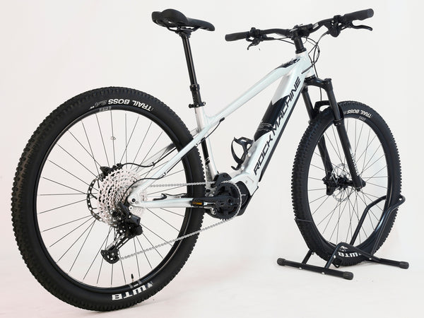 Side profile of RockMachine Blizz e60-29 Electric Mountain Bike showing its sleek design, LARGE size, and RRP: £3,499.00, used just 2 miles.