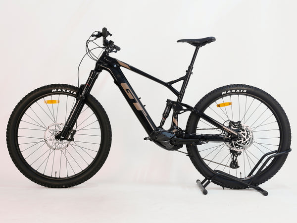 Front view of the GT E Force Amp+ Full Suspension e-Bike 2024 in XL, showcasing its Yari suspension, excellent condition, 51 miles, price £2,250.