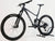 Giant Stance 29 2 2024/LARGE mountain bike in very good condition, highlighting a sleek satin black diamond finish and dropper seat post.