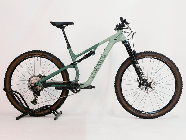 Rear suspension detail of the 2023 Canyon Neuron 7 Full Suspension Bike, Large size, showing the Fox Performance DPS Float, in Very Good Condition.