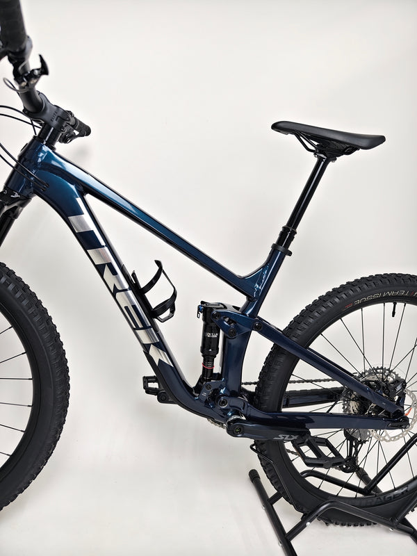 Trek Top Fuel 8 2024 Large Frame Full Suspension Bike at eMado - Picture emphasizing the bike's rear shock and linkage.