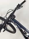 Trek Top Fuel 8 2024 Large Frame Full Suspension Bike at eMado - Image capturing the bike's aesthetic appeal on a trail.