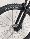 Side angle close-up of the Maxxis tire on Giant Stance 29 2 2024/LARGE mountain bike.