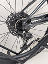 Focus on the rear derailleur and cogs on Giant Stance 29 2 2024/LARGE mountain bike.