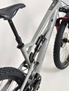 Nukeproof Mega 275 RS X01 Eagle bike displayed at a 3/4 angle, emphasizing its aggressive stance and tire setup.