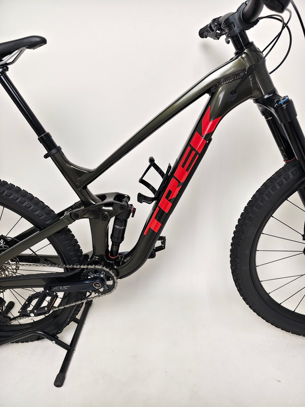 Rear view of Trek Slash 7 2022, emphasizing the rear shock and frame construction, showcasing its Excellent Condition - Large Frame.