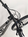 Image focusing on the suspension linkage of the Merida One-Sixty 500 29 2023 mountain bike.