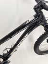 The front suspension fork on Nukeproof Scout 275 RS 2023 in excellent used condition, highlighting its features.