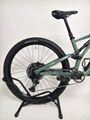 Panoramic view of the used Specialized Stumpjumper Comp Alloy displayed outdoors.