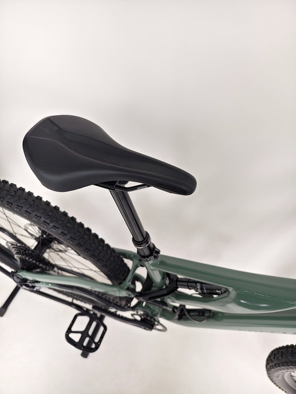 Close-up shot of the used Specialized Stumpjumper Comp Alloy brakes and rotors.