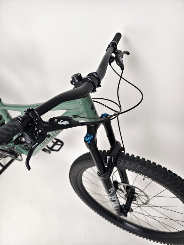 Full view of the used Specialized Stumpjumper Comp Alloy indicating condition and build quality.