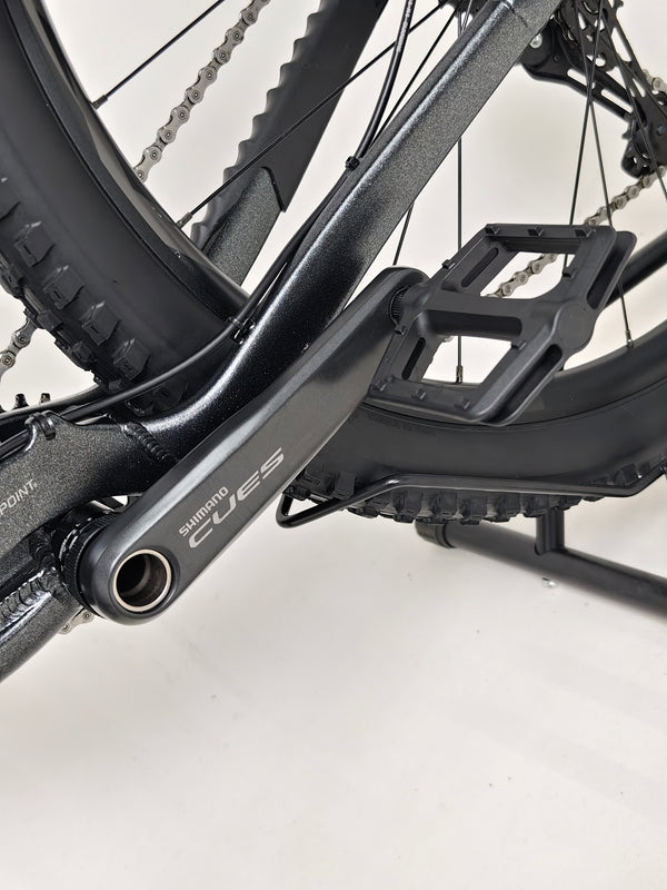 Giant Stance 29 2 bike with attention on its stylish frame and lightweight build.