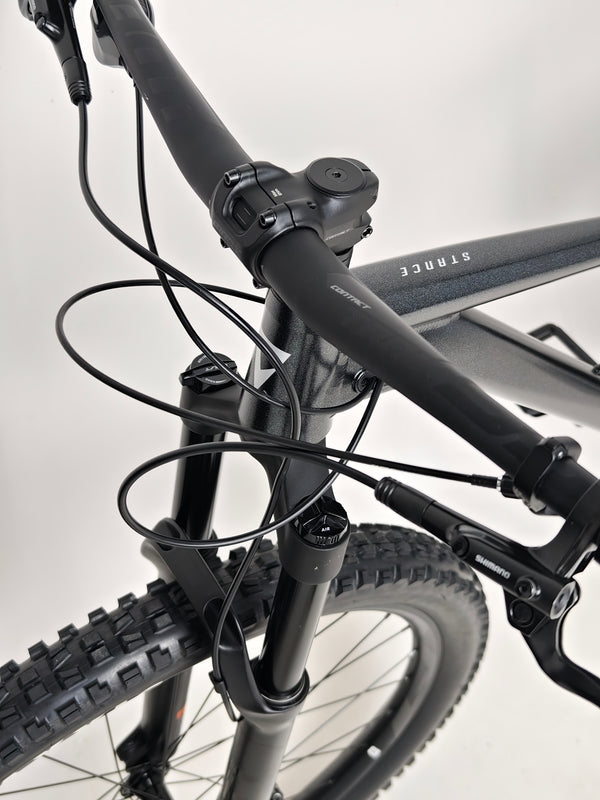 Profile of Giant Stance 29 2 showing off its unique frame and color finish.