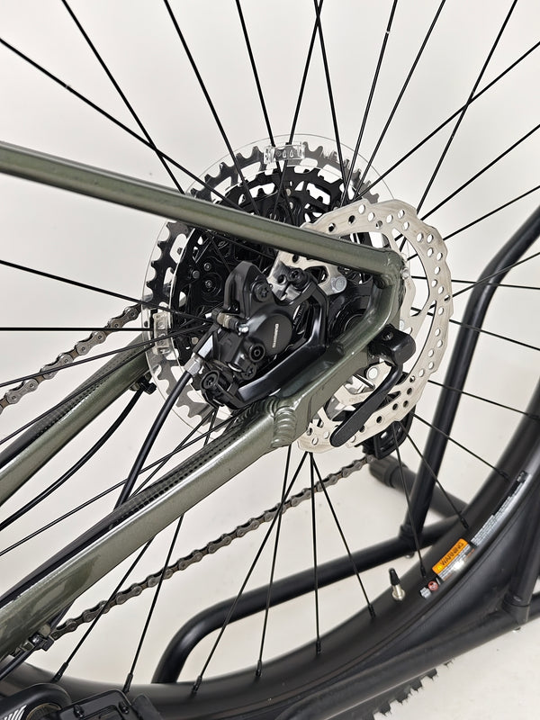 2023 Cannondale CUJO 2 bike positioned against a backdrop showcasing its vibrant colour.