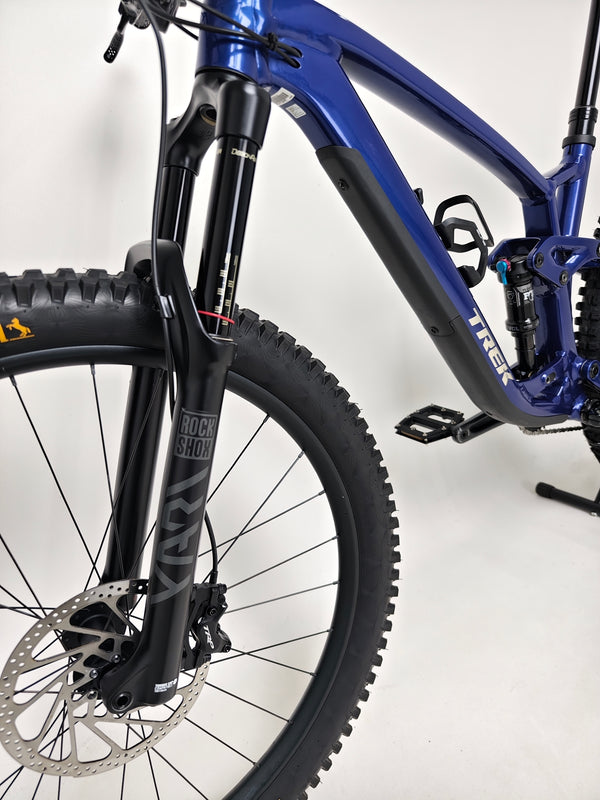 Trek Fuel EX 7 2024 Gen 6 (upgraded), M-L in Very Good Condition - side view capturing the bike in profile.