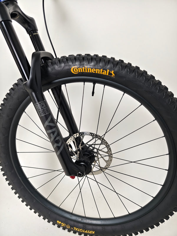 Trek Fuel EX 7 2024 Gen 6 (upgraded), M-L in Very Good Condition - storing the bike on a rack.