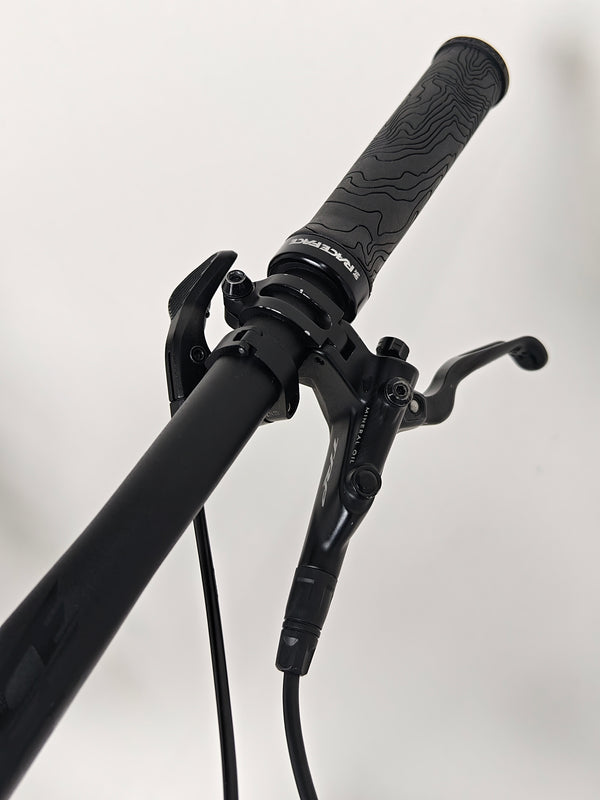 Trek Fuel EX 7 2024 Gen 6 (upgraded), M-L in Very Good Condition - capturing the cockpit with its components.