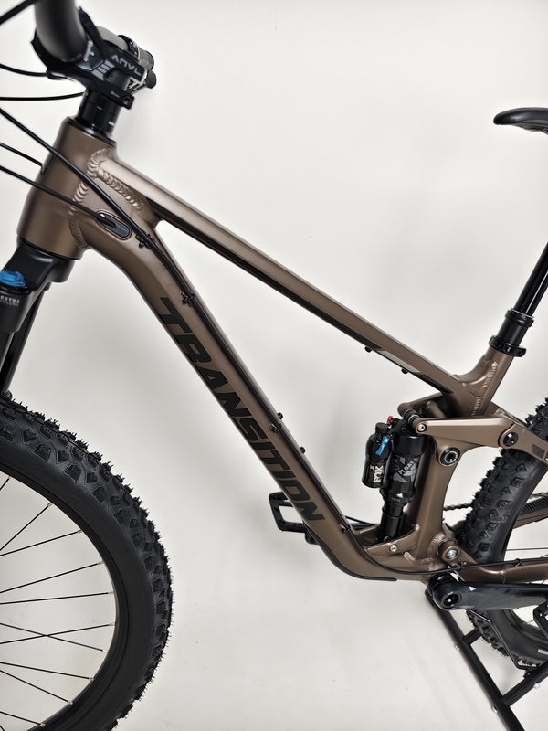 Profile view of the Transition Smuggler NX 2024 in medium, illustrating its robust build and custom design.