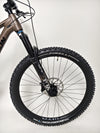 Image showcasing the rear wheel of the Transition Smuggler NX 2024 in medium, highlighting performance tubes.
