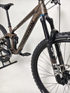 Action shot of the Transition Smuggler NX 2024 in medium, perfect for mountain biking adventures.