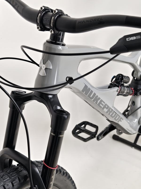 Nukeproof Mega 290 CARBON - High-definition image of bike frame focusing on craftsmanship.