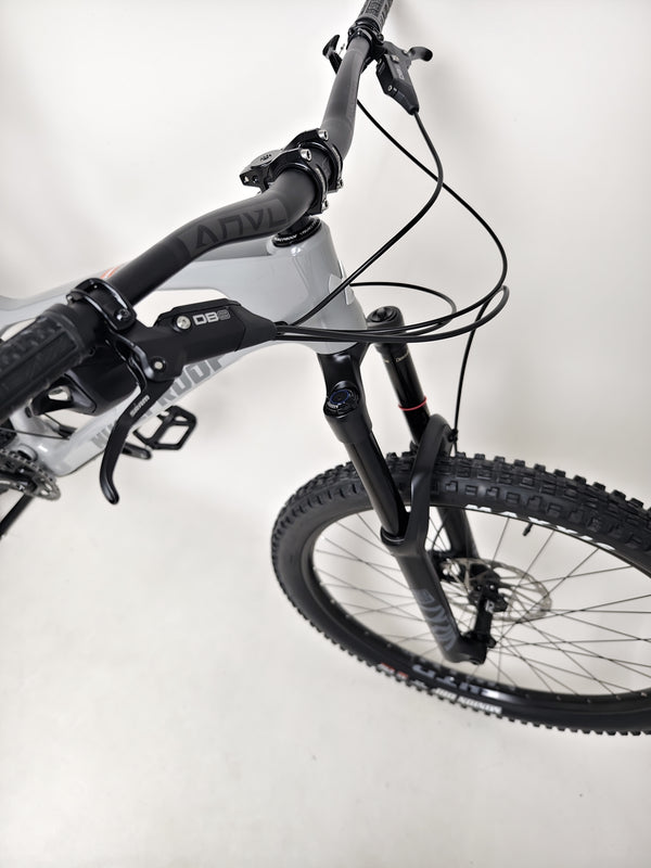 Nukeproof Mega 290 CARBON - Close-up of the bike's dropper seat post mechanism at full extension.