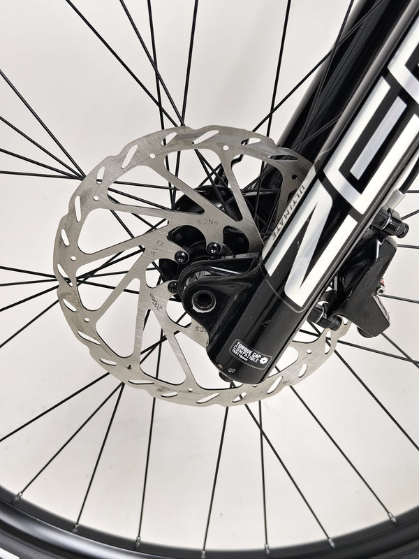 Dynamic trail action shot with the Orange ALPINE 6 Full Suspension Mountain Bike.