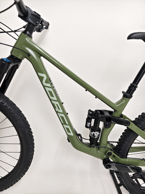 The Norco Sight A2 2021 mountain bike in a gentle ride pose, emphasizing its sleek design.