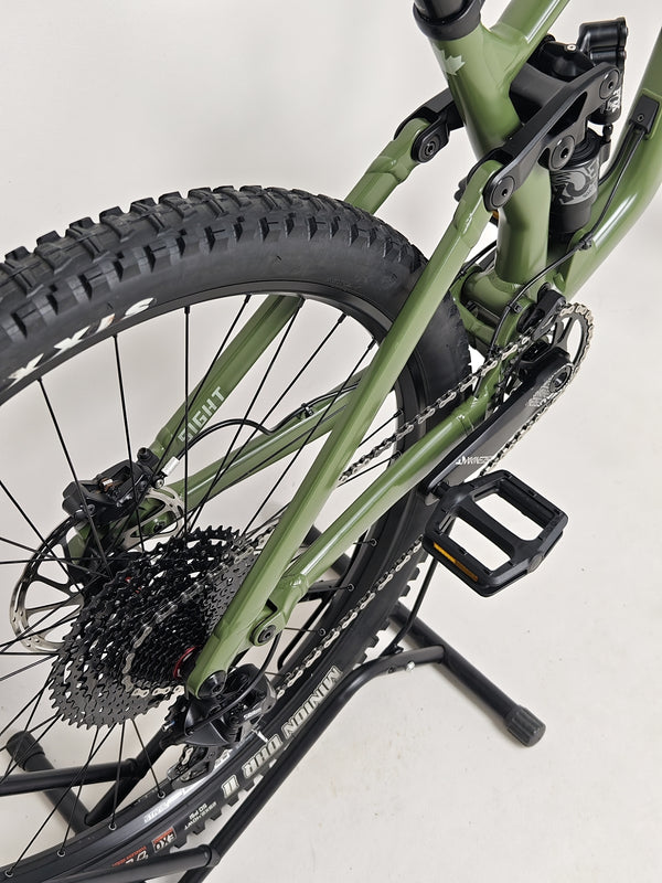 Norco Sight A2 2021 mountain bike resting in a bike rack, demonstrating its readiness for the next ride.