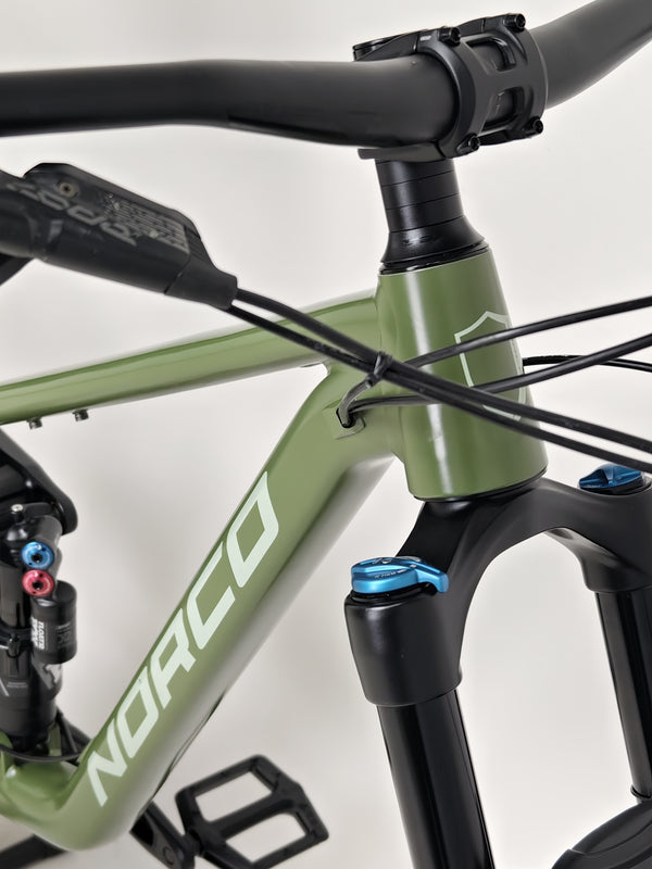 Close-up of the brake system on the Norco Sight A2 2021, including the 200mm front and 180mm rear rotors.