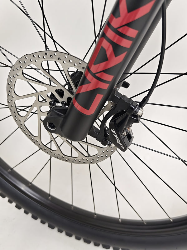 Whyte T-160 S 2025 displayed on stunning mountain backdrop, ideal for outdoor enthusiasts.