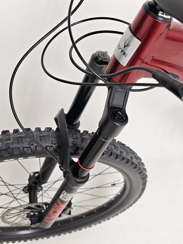 Elegant view of the suspension features on the Whyte T-160 S 2025 mountain bike.