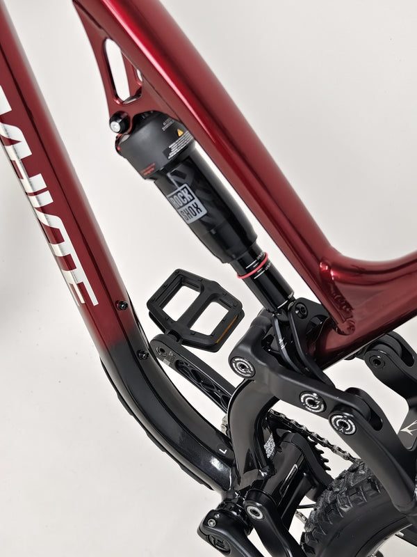 Underneath view of the Whyte T-160 S 2025, highlighting the alloy symmetric SCR rear triangle.