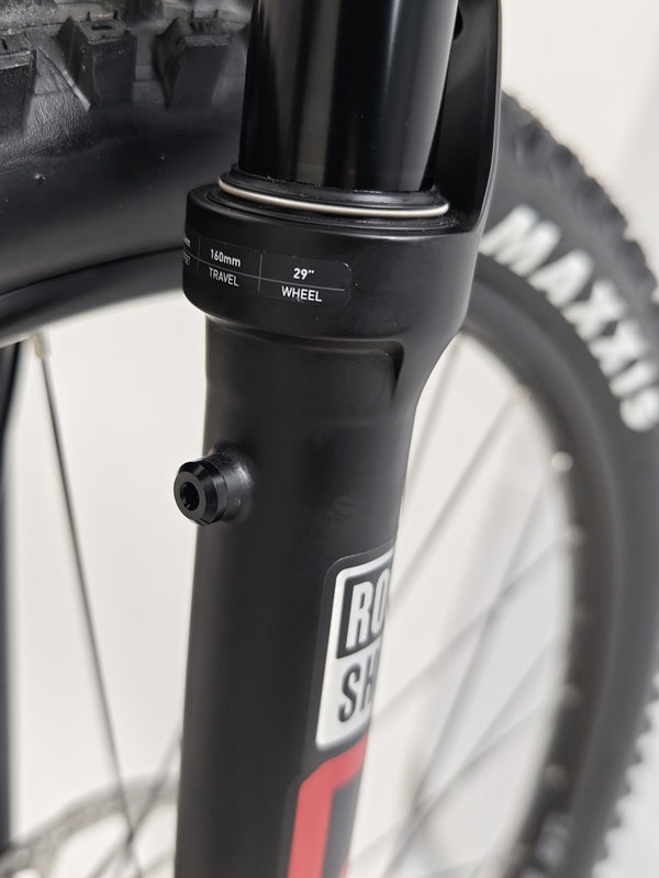 Close photo demonstrating rear suspension features of the Whyte T-160 S 2025 mountain bike.
