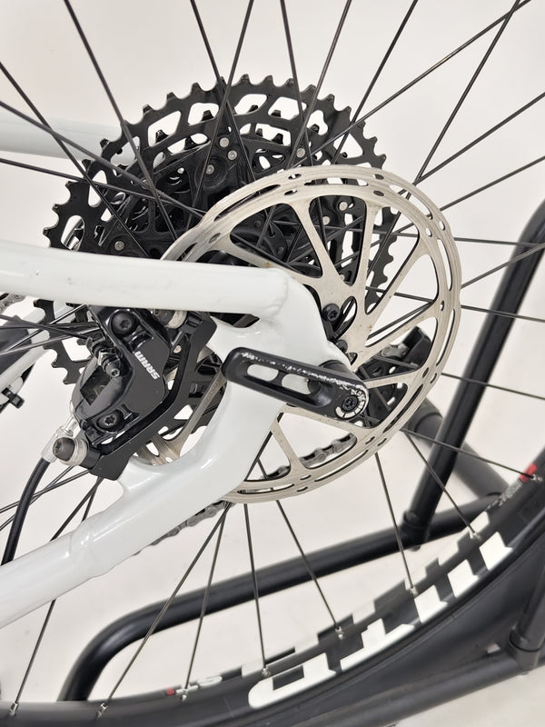 Action shot of the Whyte 905 V5 2023 Mountain Bike in a natural setting, demonstrating its off-road capabilities.