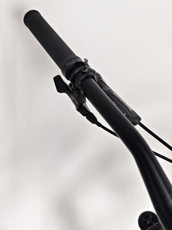 Captured action of the Whyte 905 V5 2023 Mountain Bike maneuvering through terrain.