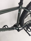 Close-up of the handlebars of the Whyte 901 V4 2022 Mountain Bike featuring controls and grips.