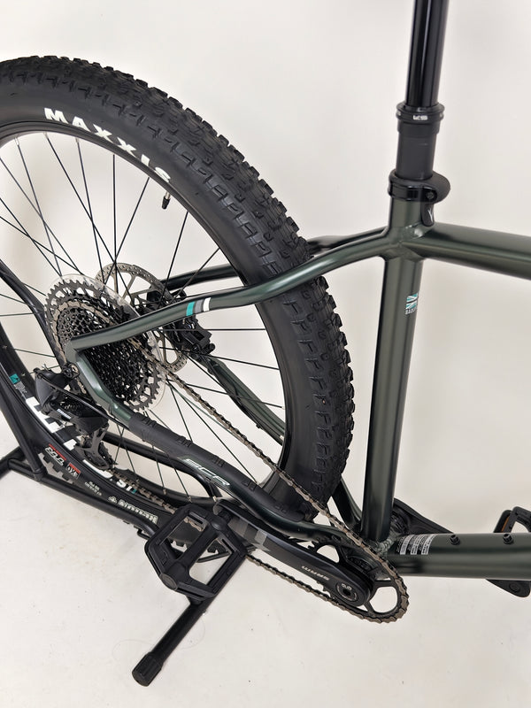 Whyte 901 V4 2022 Mountain Bike positioned in an outdoor setting to emphasize its rugged design.