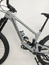 Nukeproof Giga 290 Comp Carbon 2022 bike with detailed view of the brakes and wheels.