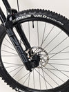 Close-up of the crank and pedals of the Nukeproof Giga 290 Comp Carbon 2022.