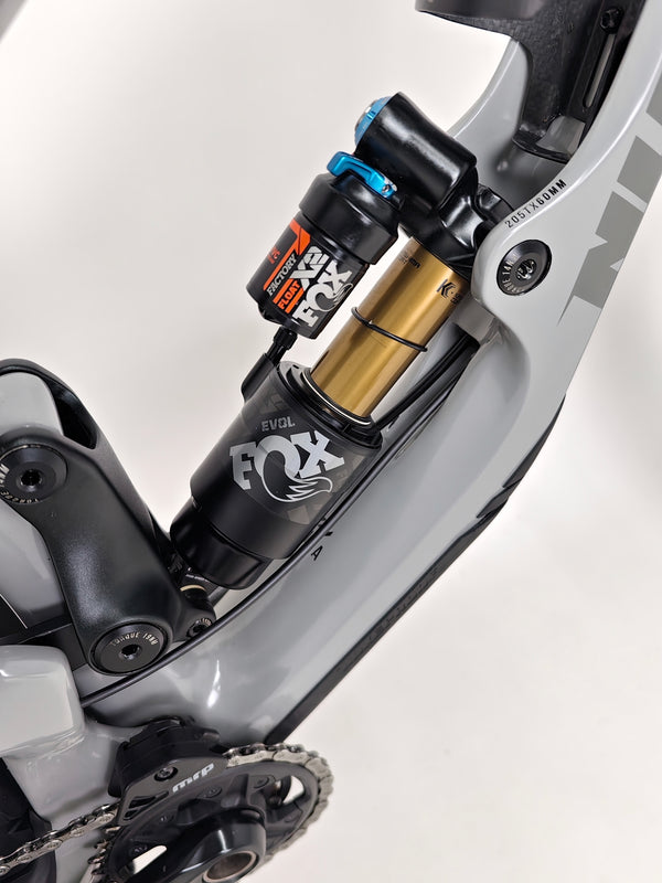 Nukeproof Giga 290 Comp Carbon 2022 bike on display with a clean background.