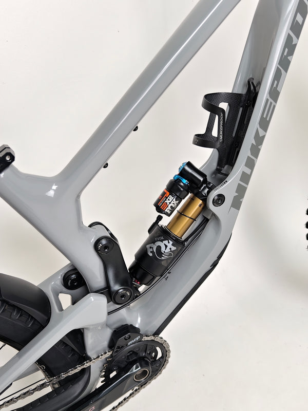 Nukeproof Giga 290 Comp Carbon 2022 bike's artistic angle highlighting the frame.