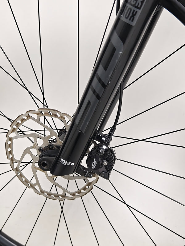 Scott Spark RC 900 Team Issue AXS Carbon showing the tubeless ready wheels.