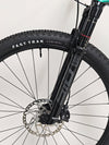 Close-up showing the ergonomic grips on the Scott Spark RC 900 Team Issue AXS Carbon.